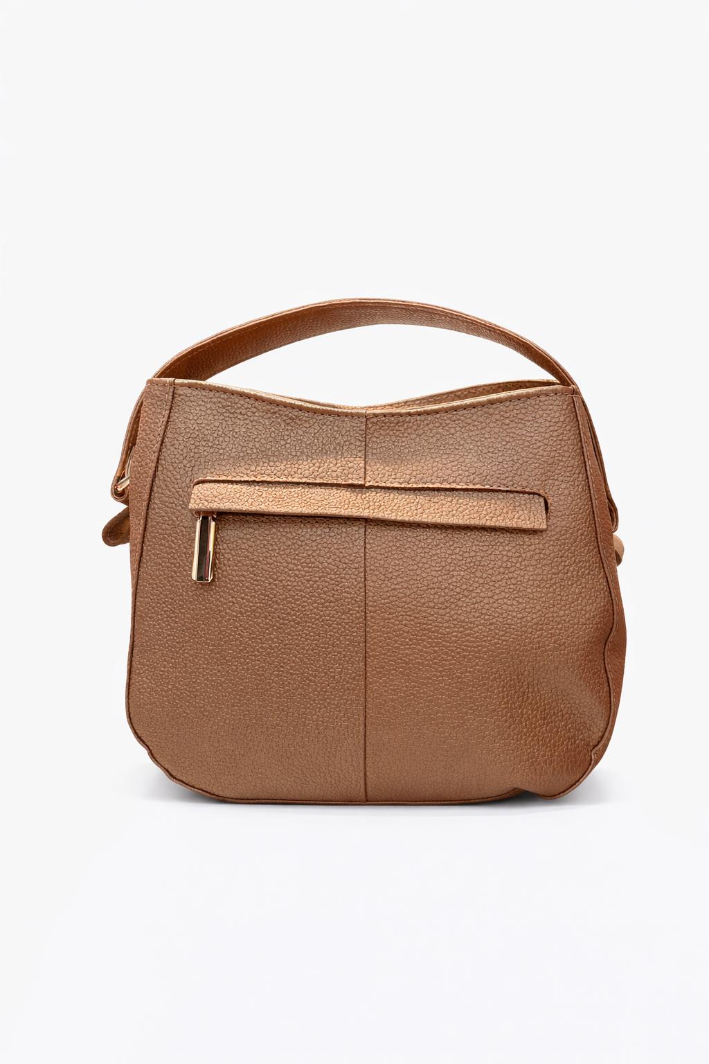 Bolso de mano bronce con diseño y texturas grabadas