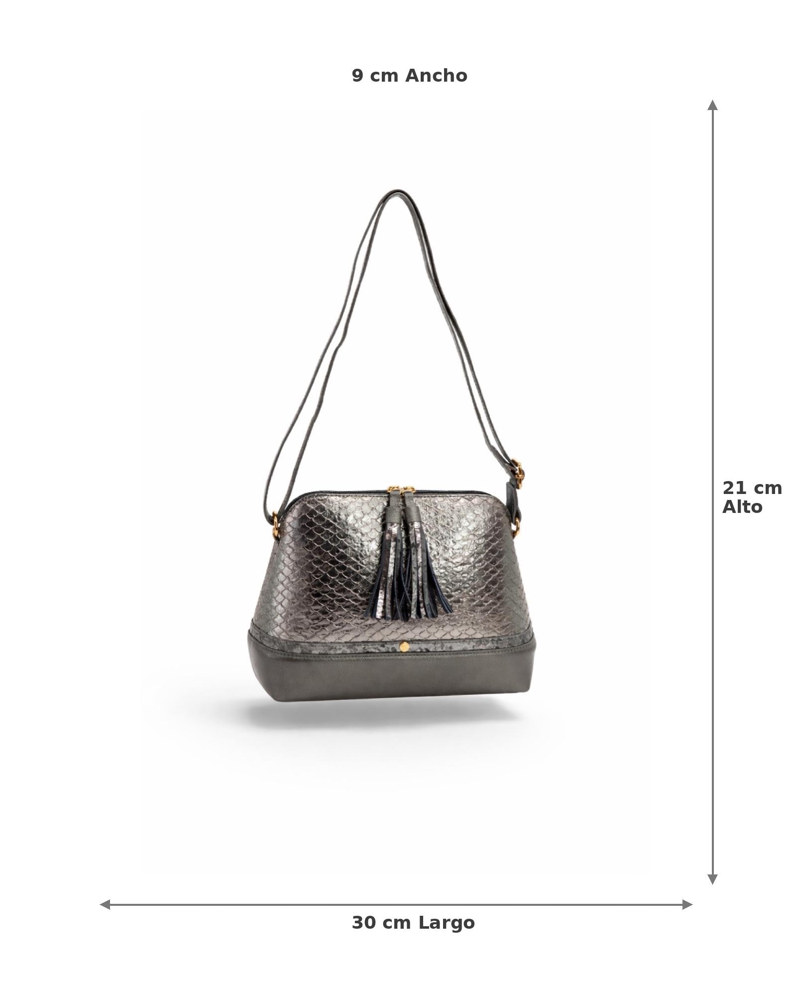 Bolso bandolera caño fusil  con textura grabada y borlas decorativas